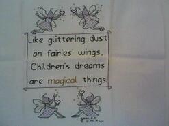 Cross stitch square for Isla J's quilt
