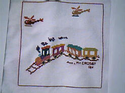 Cross stitch square for Cooper (E)'s quilt