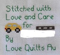 Cross stitch square for Cooper (E)'s quilt